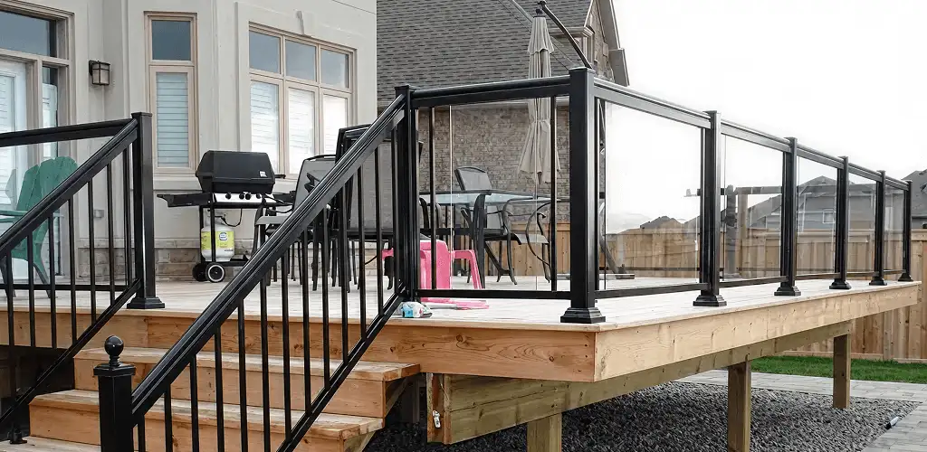 Handrail installation on a deck staircase for safety and code compliance in Albany, NY