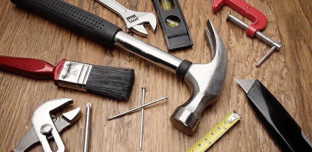 Handyman tools laid out for home repair and maintenance work in Albany, NY